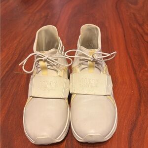 Puma women’s  Sneakers in Cream and Yellow